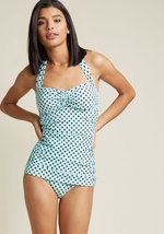 Inspired by a beloved shoreside pastime, this one-piece swimsuit is flattering on an array of body types. Featuring a bold, all-over black polka dots, low-cut legs, and flirty front ruching, this ModCloth-exclusive, mint green suit from Esther Williams wi by E11006