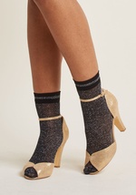 The feeling you get from having sparkles on your feet just can't be beat, so nab these gold socks and get by 3041