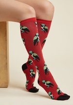 Owls? On knee-high socks? Awesome! This red footwear flaunts beige, black, yellow, and teal birds of prey that'll protect your toes from any chill that should try to come your way. Pretty epic, isn't it? by 