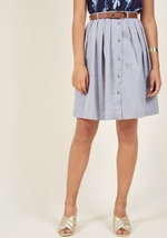 Each day when you dress, you feel fortunate to wear this navy-blue skirt. The woven fabric is casual yet sharp, and the addition of the classic brown belt, button-up front, and flared pleats make this skirt a wardrobe staple. However you style it, you'll  by 