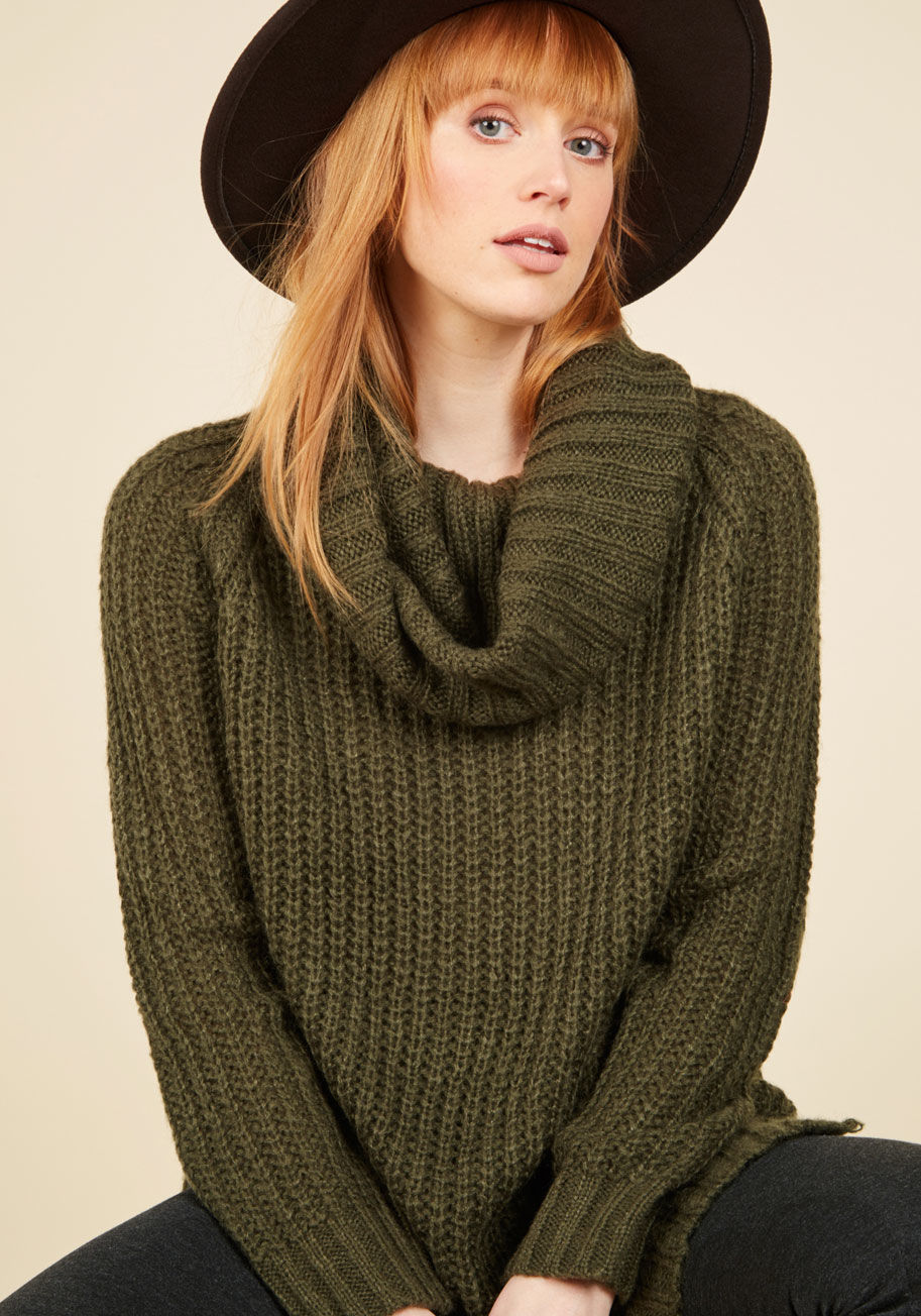  - A return trip to your northern roots is the perfect opportunity to debut this ivory sweater. Meeting with old pals, classmates, and family is made all the better with the cozy cowl neck, vented sides, and oversized fit of this essential pullover, because 