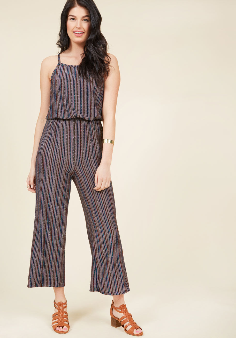  - Advise your friends to grab some sunnies, because once you debut this bold jumpsuit paired with your brilliant disposition, they'll certainly need the shades! A blend of red, yellow, silver, cobalt, and aqua stripes touched with metallic threads assist it