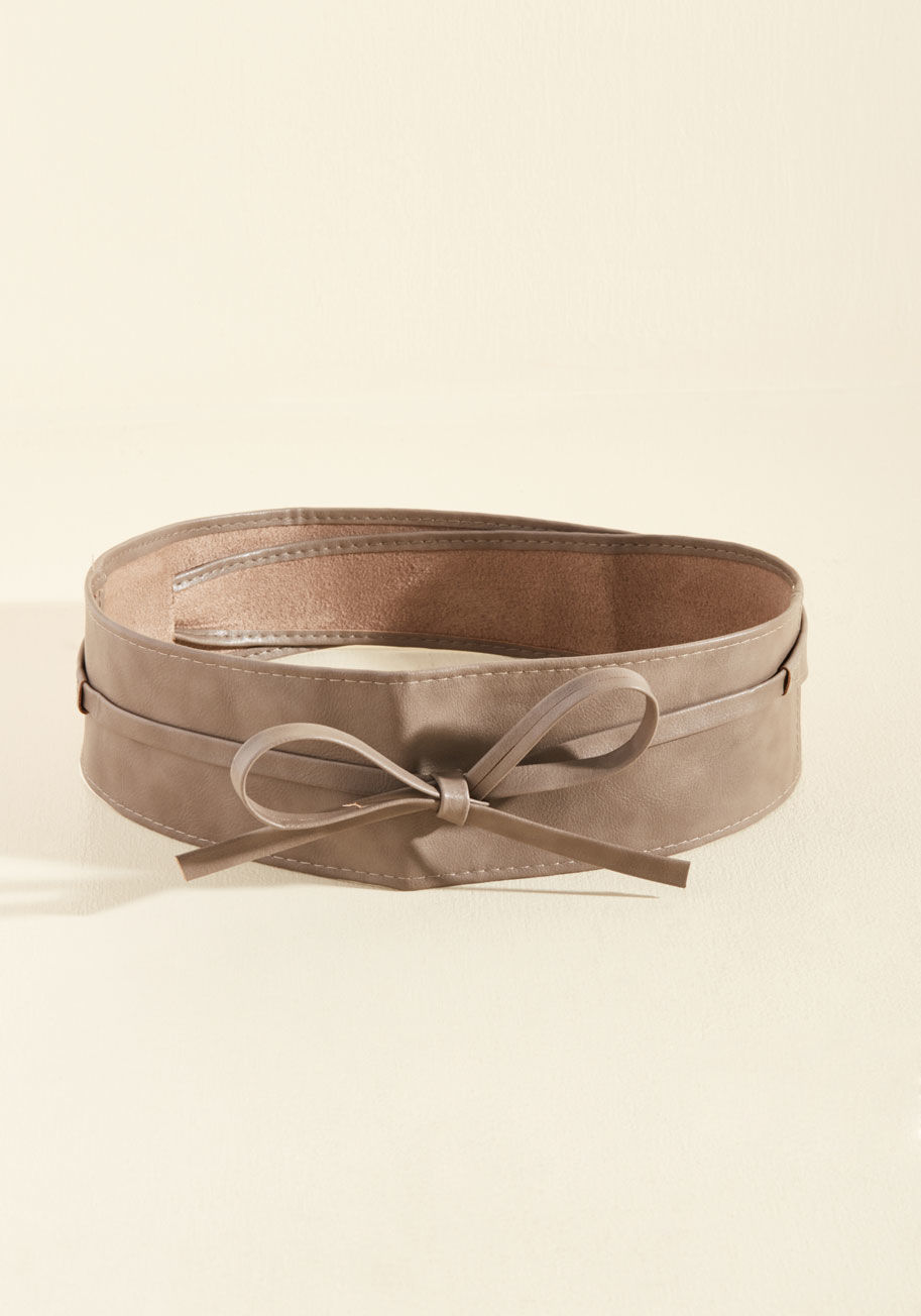 Are you a maniac when you get on the dance floor? If the answer is yes, might we suggest donning this super-cute belt to help define your fab figure while you're twisting and twirling? This vegan faux-leather sash by 