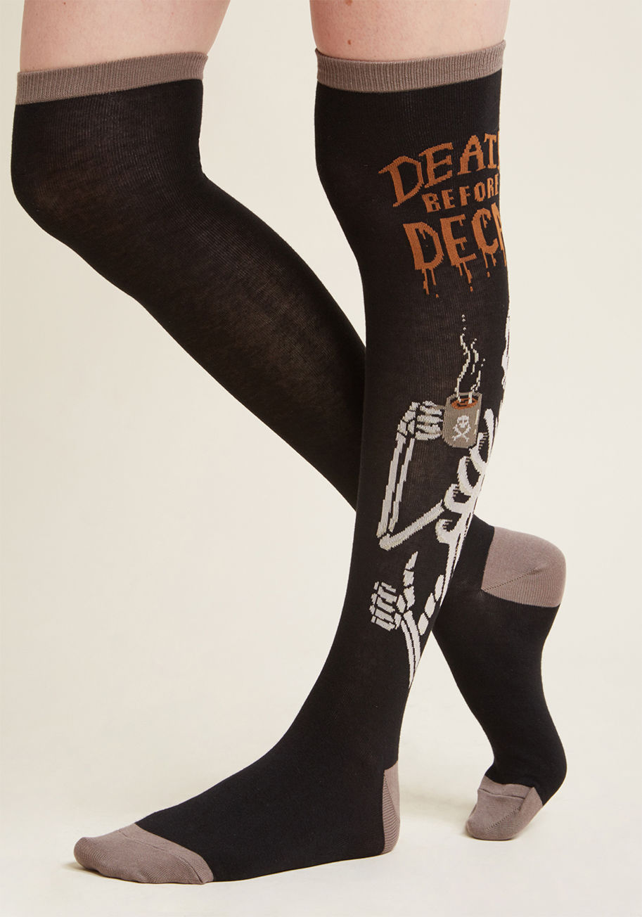  - Assert your status as the queen of caffeine with these black knee socks! Starring a bold message