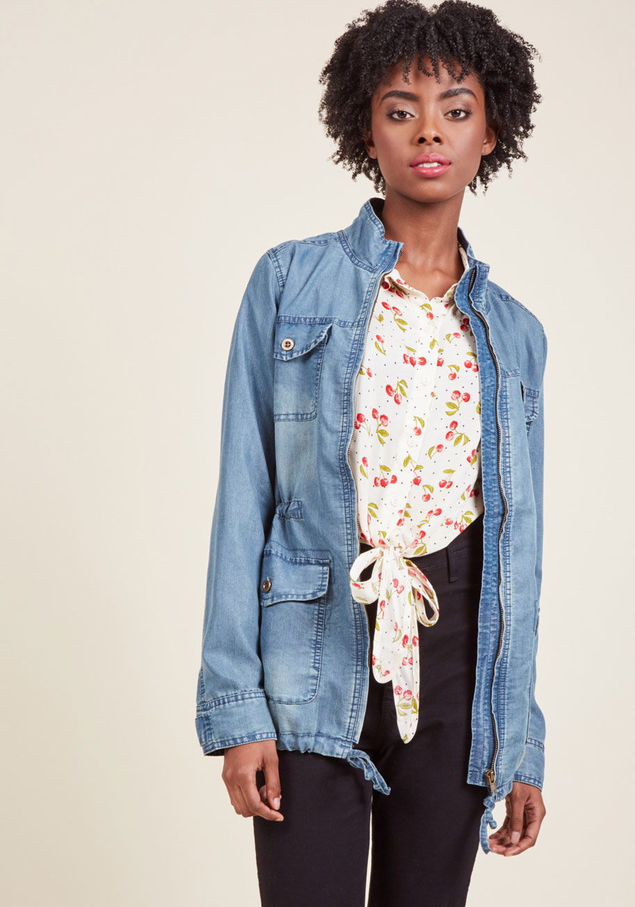  - Countryside, coast, city, or savanna, this chambray jacket is great to have on hand! Boasting buttoned pockets at the chest and hips, drawstring ties at the waist and hem, and a zipper running right up the center of its stand-up collar, this versatile ano