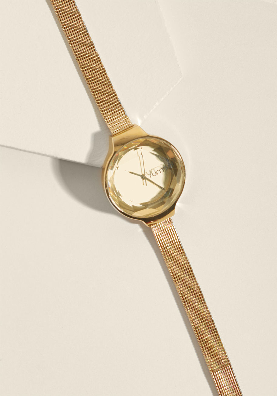  - Every aspect of an ensemble is of utmost importance. Attend to the particulars of your outfit by wearing this gold watch as the finishing touch. A slim, stainless-steel mesh strap affixes this pretty piece by RumbaTime to your wrist, while a delicate, fas