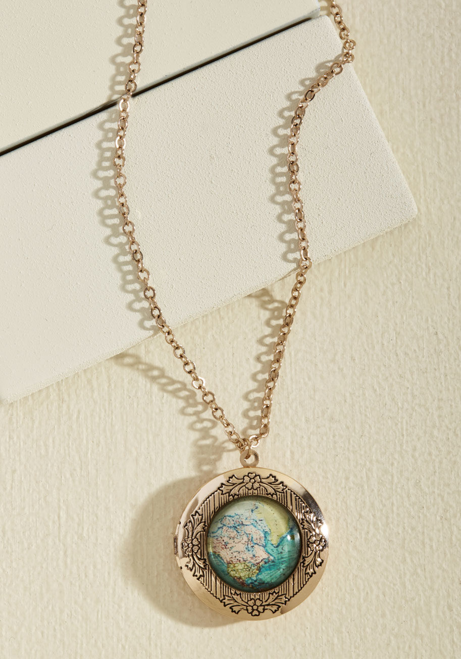  - Hello? Anyone home? Earth to ModGirl! It&rsquo;s clear that you only have eyes for this ModCloth-exclusive necklace, as you&rsquo;re entirely captivated by functional locket pendant, antiqued gold rim, and colorful print of far-off destinations!