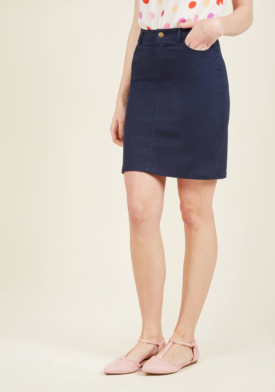  - If ever there were a gal who's always game to make days, it's you. And, the solid, versatile navy hue of this stretch twill skirt make simple work of such a task! With front pockets, a smooth back, and a high waist, this ModCloth namesake label separate i