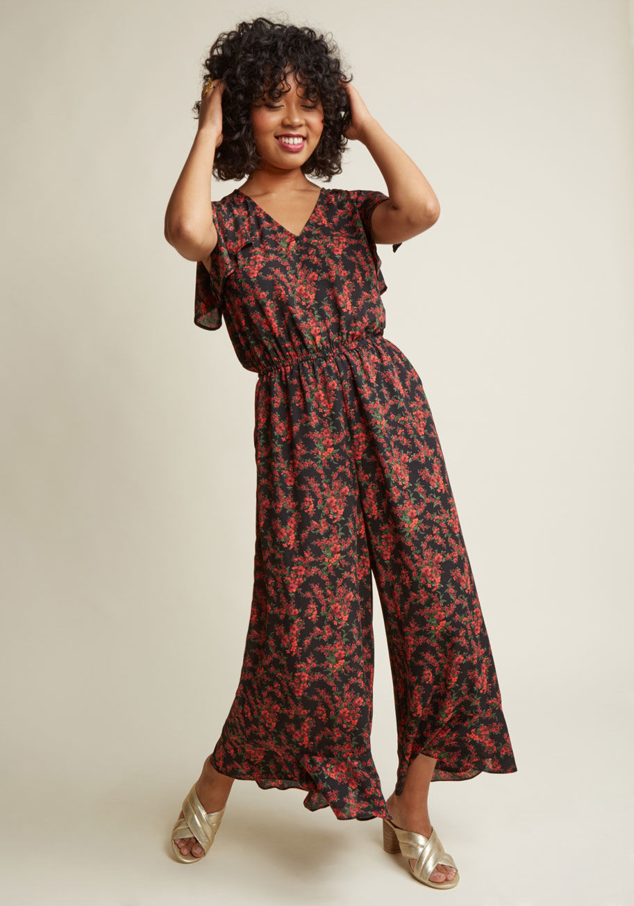  - It's a beautiful day to create, so slip into this black jumpsuit from Jack by BB Dakota and get to makin'! Who knows what the the flutter sleeves, flowy, ruffled legs, and red floral print of this artsy ensemble will inspire, but one thing is for sure - w