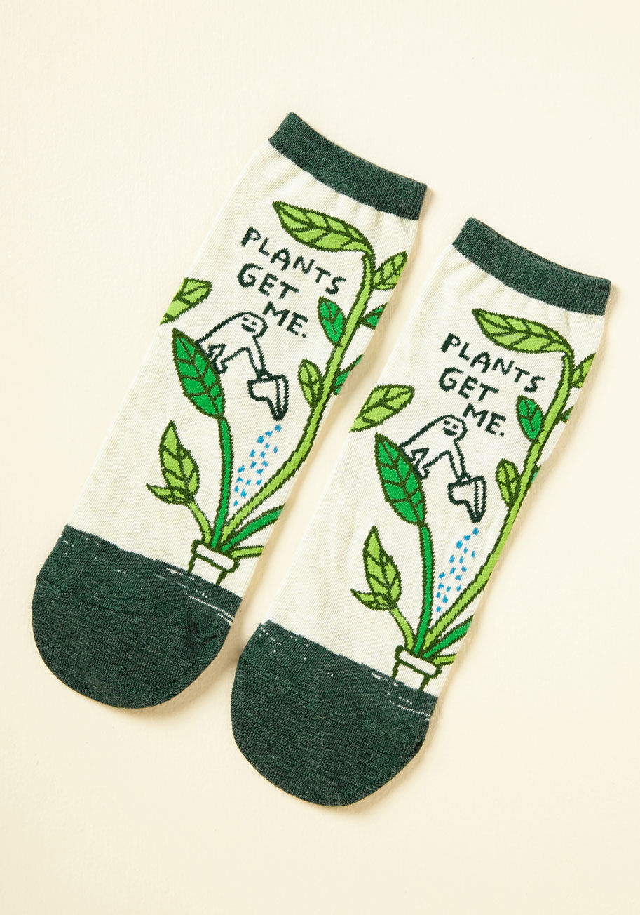  - Something on your mind? These ivory ankle socks suggest you take to plant therapy to work through it. With dark green trim and a lil' dude watering his leafy confidante, this pair soothes you while it styles you!