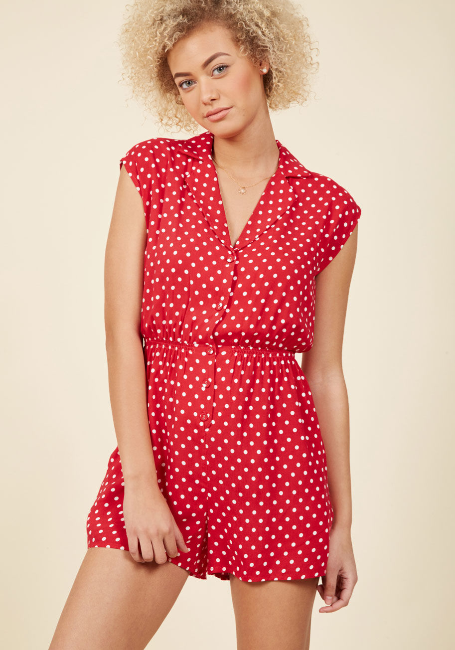  - Spend a winning afternoon with a bittersweet love story, hot tea, and the cool comfort of this collared romper. Sporting its vintage-inspired design, sepia-toned florals with a pop of orange, smocked waistline, and slit pockets, you know you'll look back 