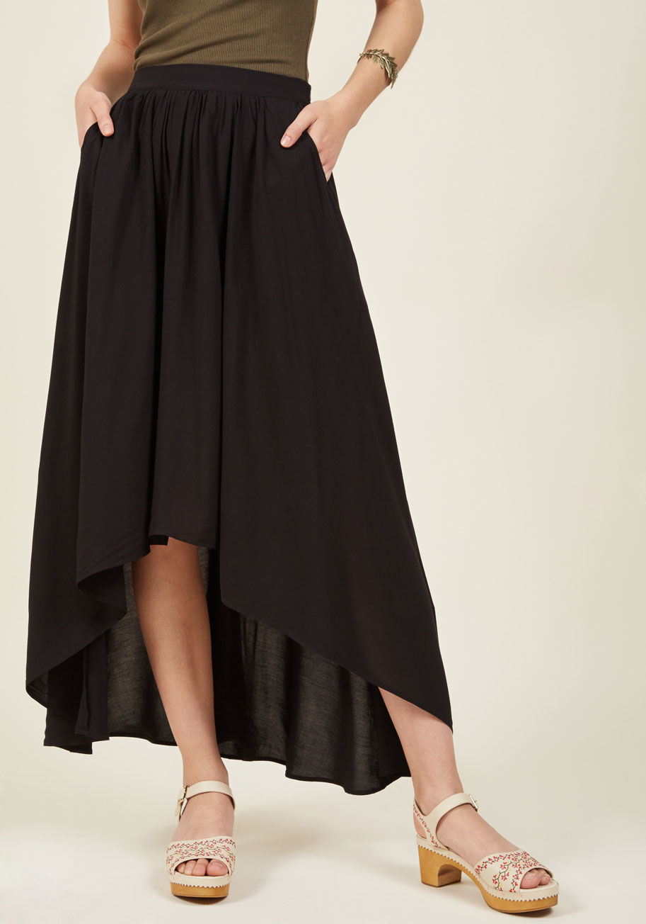  - The bold looks you'll create with this black skirt will prompt others to follow your creative ways! Pockets, breezy fabric, and a high-low hem amplify the staple quality of this ModCloth-exclusive garment, as they effortlessly put you ahead of trends and 