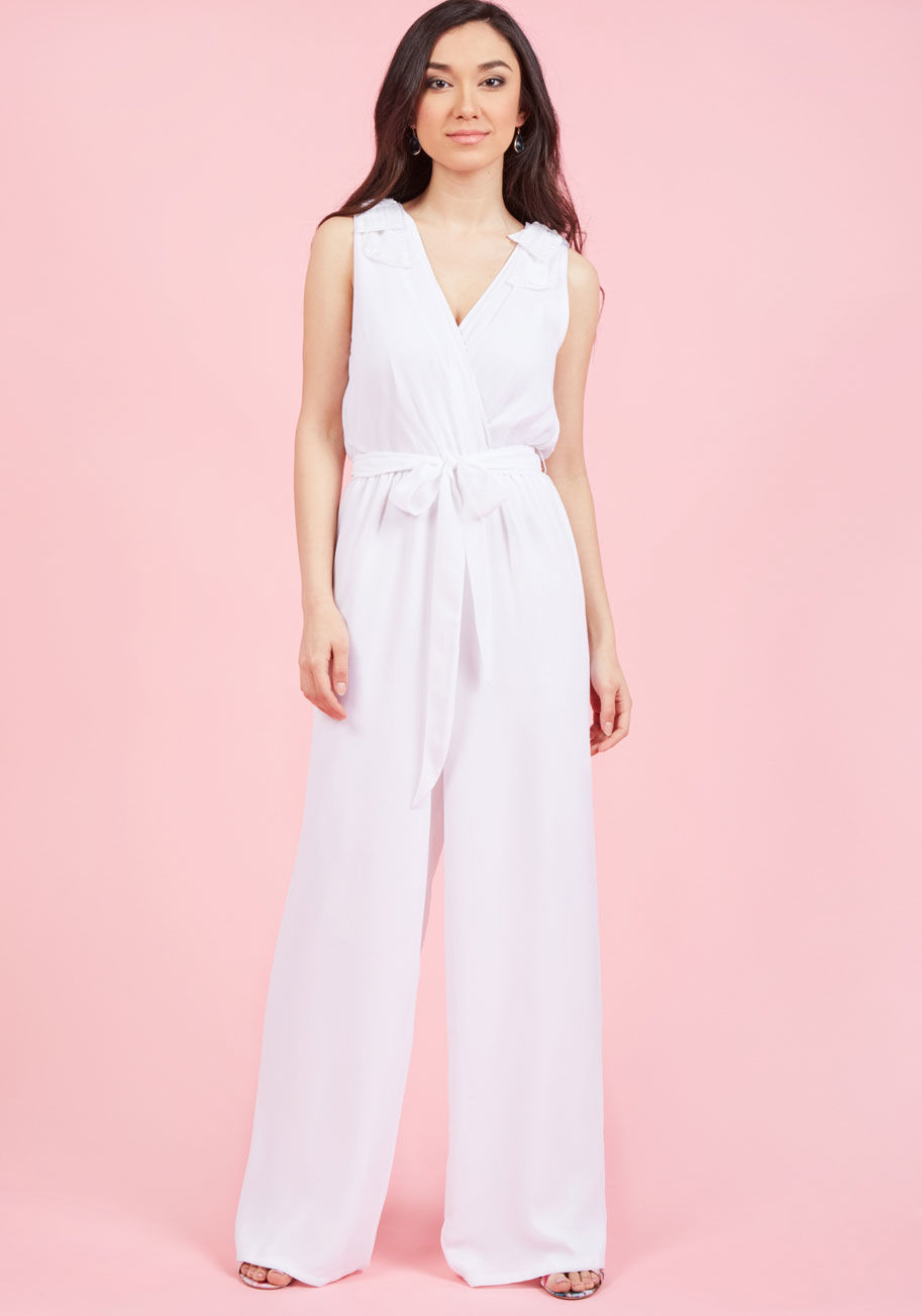  - There's no greater way to accessorize this white jumpsuit than with the blissful smile you wear alongside its beaded-and-sequined shoulder bows! As if the occasion itself wasn't enough to make you gleam, this winsome one piece - a ModCloth exclusive - kee