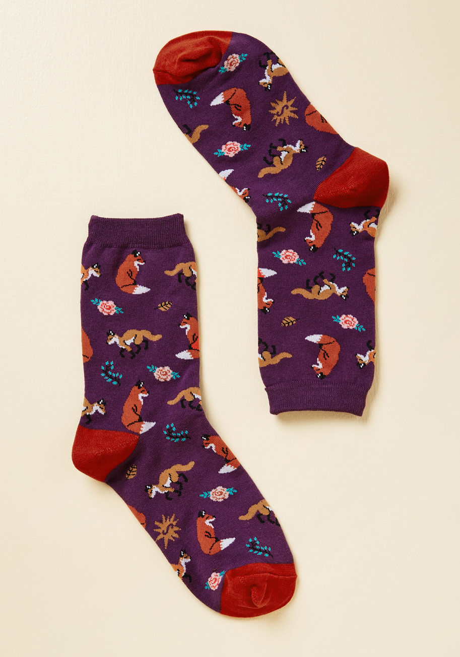  - These deep purple crew socks will inspire you to 'fox' and smell the roses! Patterned flowers, leaves, sprigs, and the clever critters themselves, and finished off with red-orange trim, this pair lets beauty and function share the spotlight.