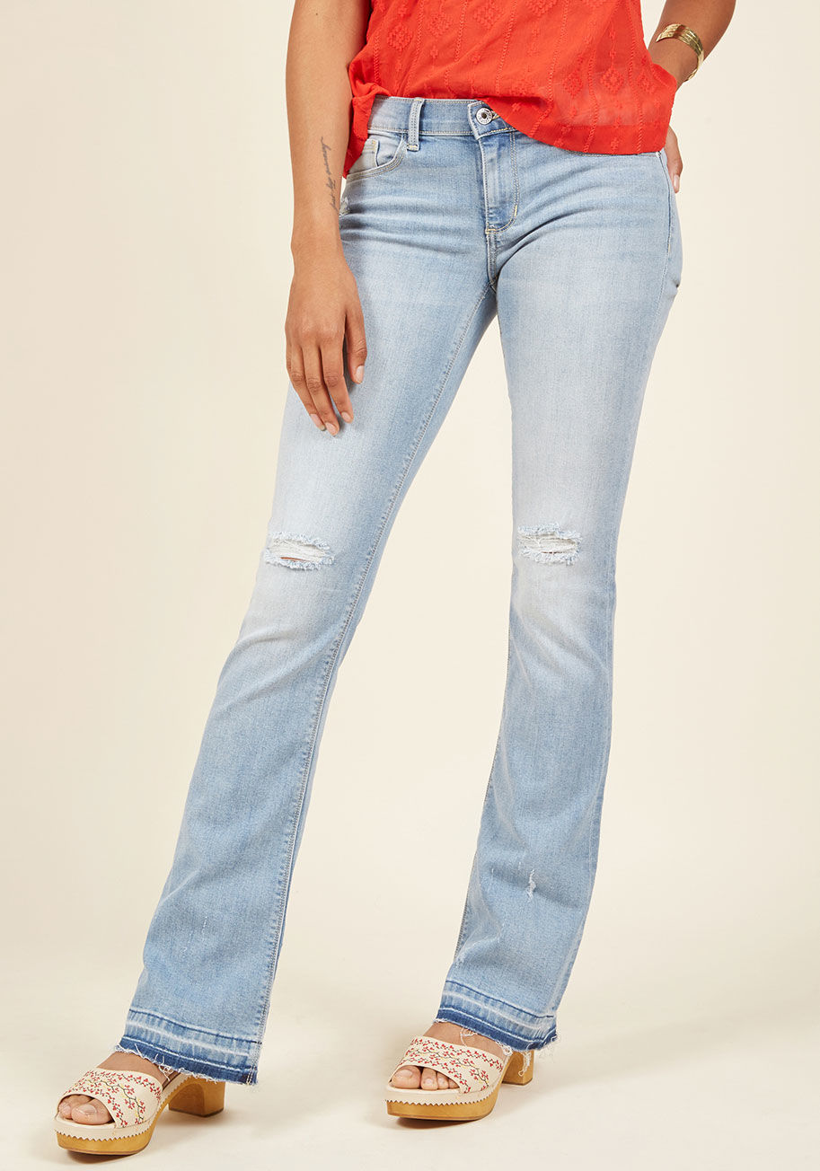  - This ain't your first foray onto the street style scene, hence the confidence with which you sport these distressed bell-bottom jeans! Letting off casual-cool vibes with their light wash, stretch denim, distressing, and frayed hems, this five-pocket pair 