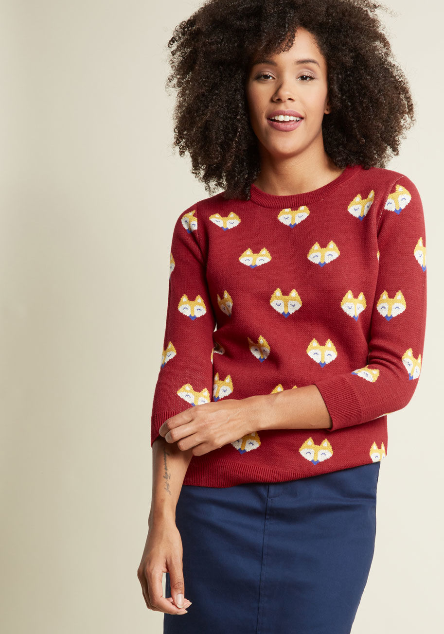  - This ModCloth namesake label sweater has just the right amount of quirk for you to wear to work! Or to school, book club, or brunch - really, anywhere you go, the primary colored fox faces and 3/4-length sleeves of this fun-loving knit will find itself be