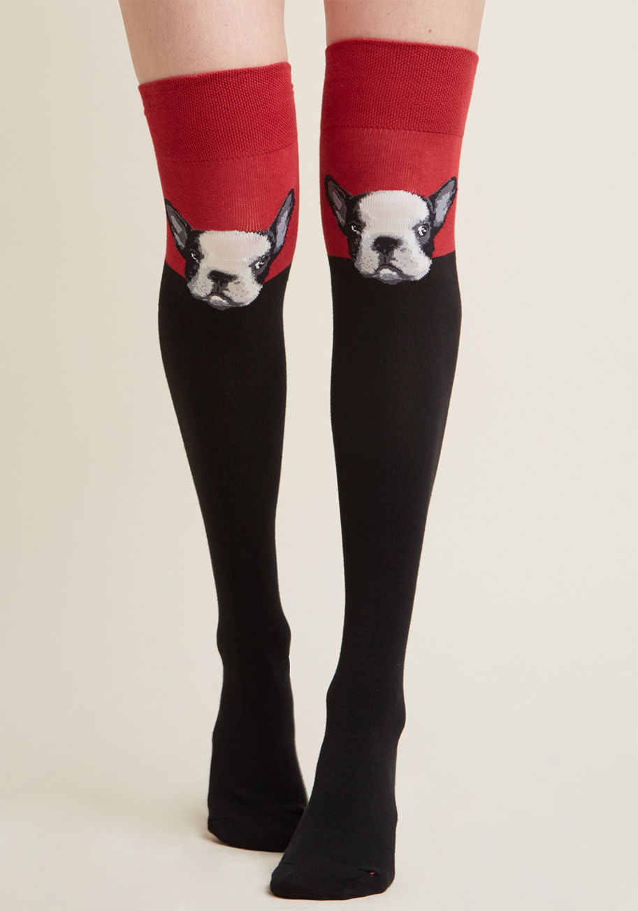  - This pair of colorblocked thigh highs is like the best friend you never knew you were waiting for! With red tops, black shins, and an adorbs French bulldog at each knee, these socks are forever quirky and cute.