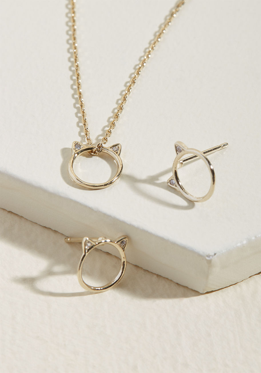  - This silver necklace and earring set will instantly satisfy those cravings for quirky accoutrements! Exclusive to ModCloth, this pendant necklace and studs duo features delicate kitty cat silhouettes with teeny-tiny rhinestones