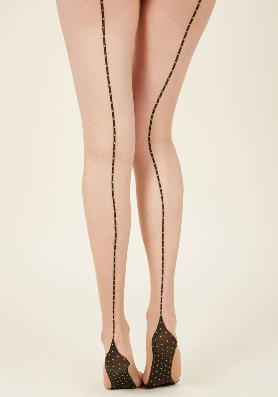  - Though their design is subtle, these sheer tights will leave you speechless! From the front, this hosiery looks classic as can be, but as you turn, the backside reveals sleek black stripes speckled with yellow dots, all the way down to the feet. Don't exp