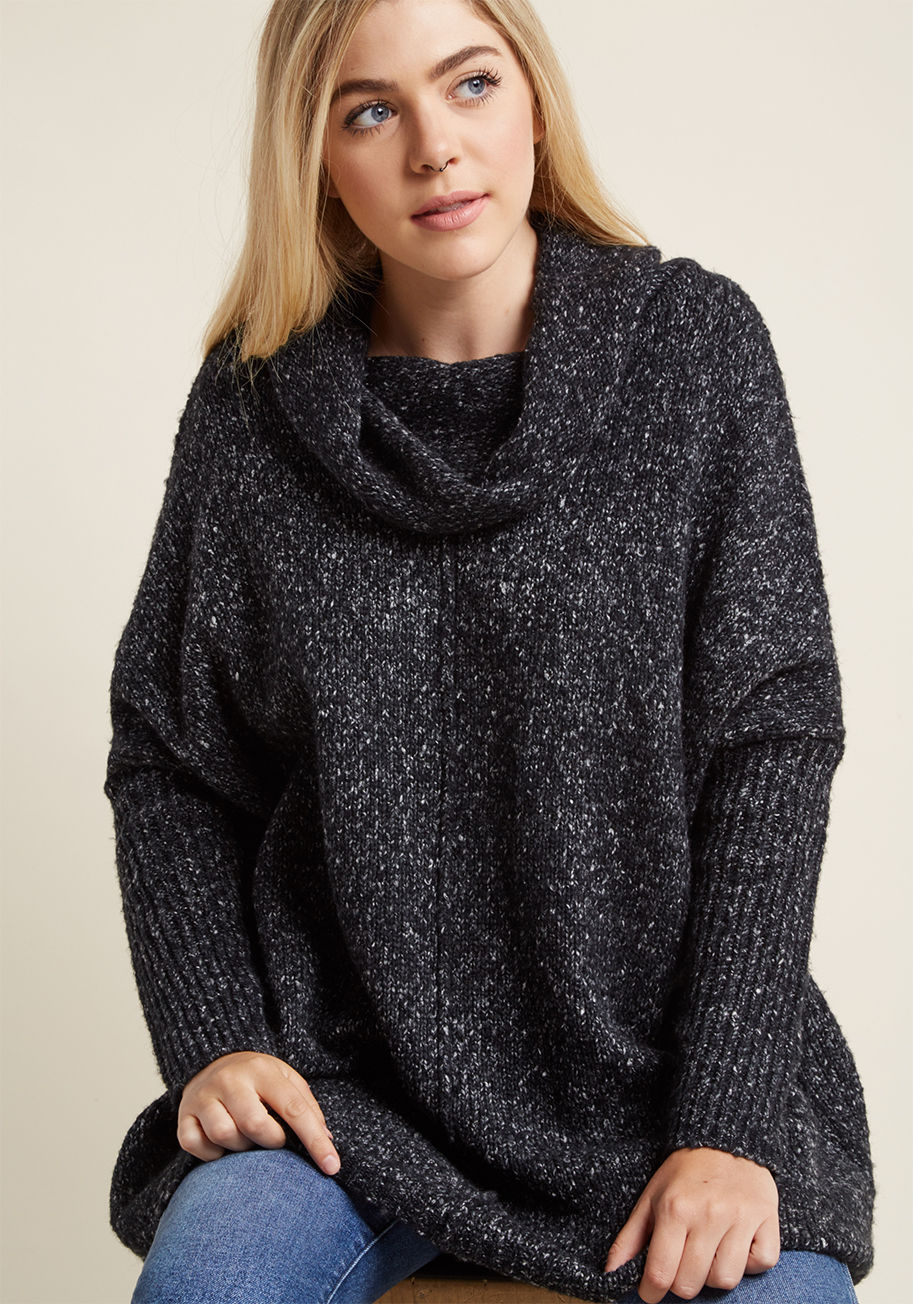  - When the week is over and it&rsquo;s time to unwind, a chill sesh with this ivory sweater is a must! Slipping into the sleek front seam, cozy cowl neck, and black-flecked knit of this dolman-sleeved pullover, you leave pressures of the week behind you and