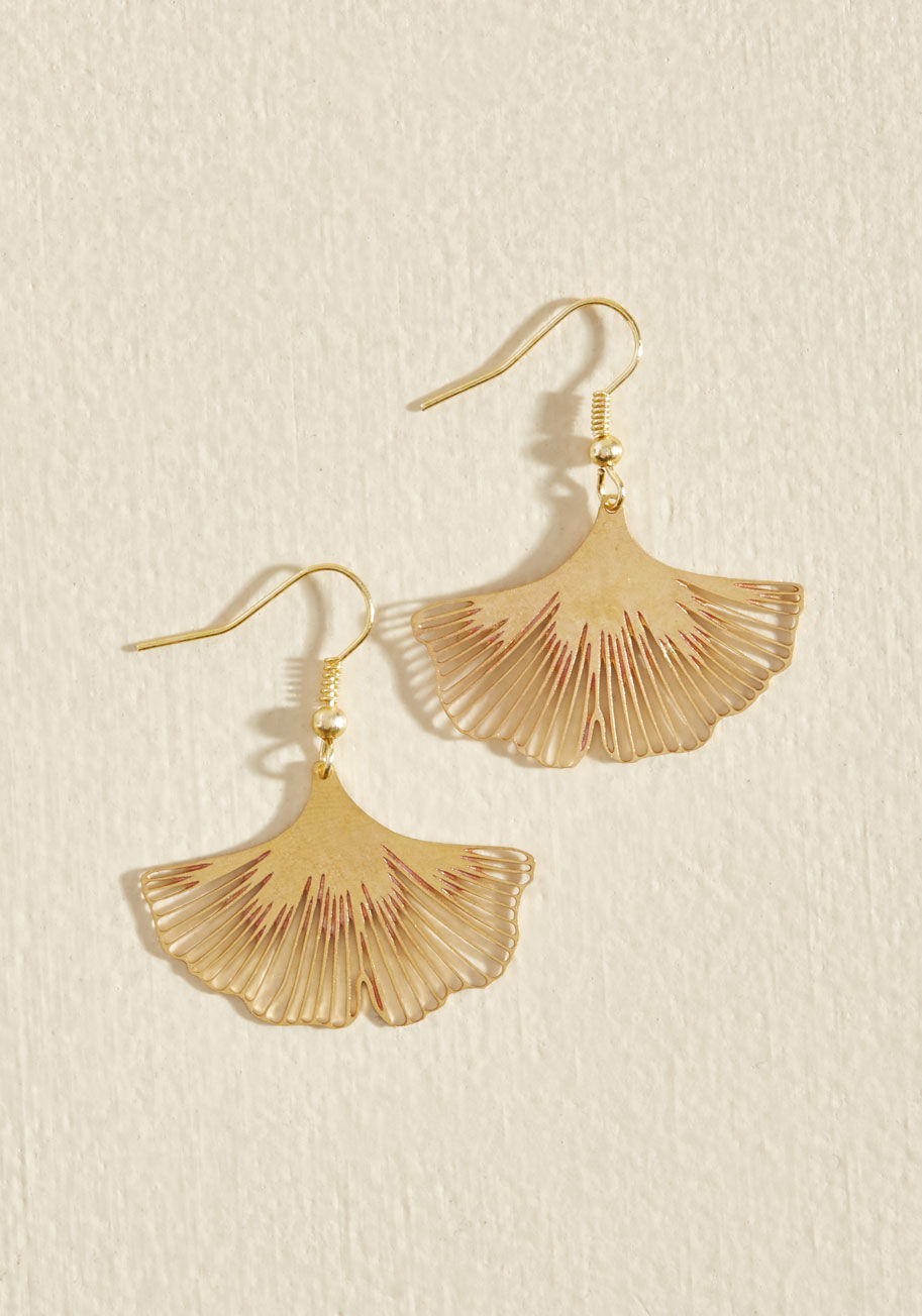  - When you have earrings as dazzling as this dangling pair by Beijo Brasil, they&rsquo;re sure to get a lot of wear! Shaped like ginkgo biloba leaves and brushed with a pink tint within each dainty cutout, this pair provides countless outfit options, thanks