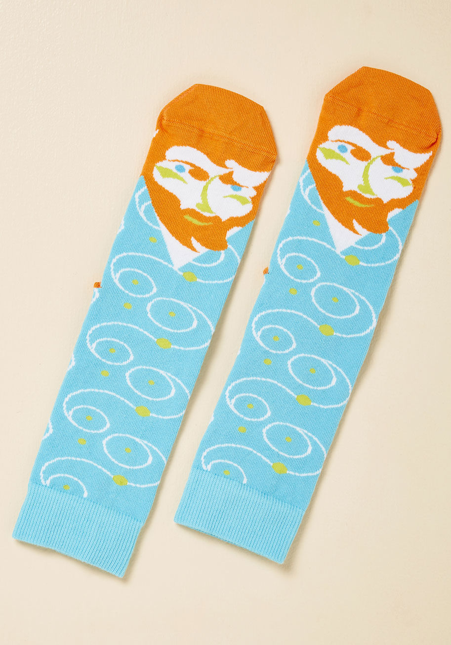 Yesterday, van Gogh was creating oil paintings, and today he takes his influential artistry right to your tootsies by way of these sky blue socks! With an image of the artist chillin' at your toes and dotted swirls creeping up the shafts, these colorful c by 