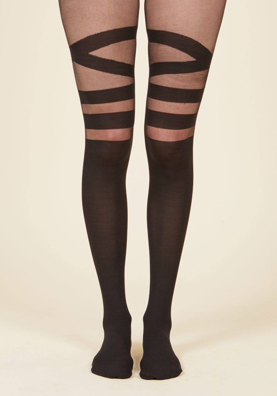  - You couldn&rsquo;t be more excited to clink glasses with the gals while wearing these sassy black tights. This sheer-meets-opaque pair flaunts bands along its knees and a crisscrossing design across the thighs - perfect to style with a fiery ensemble befo