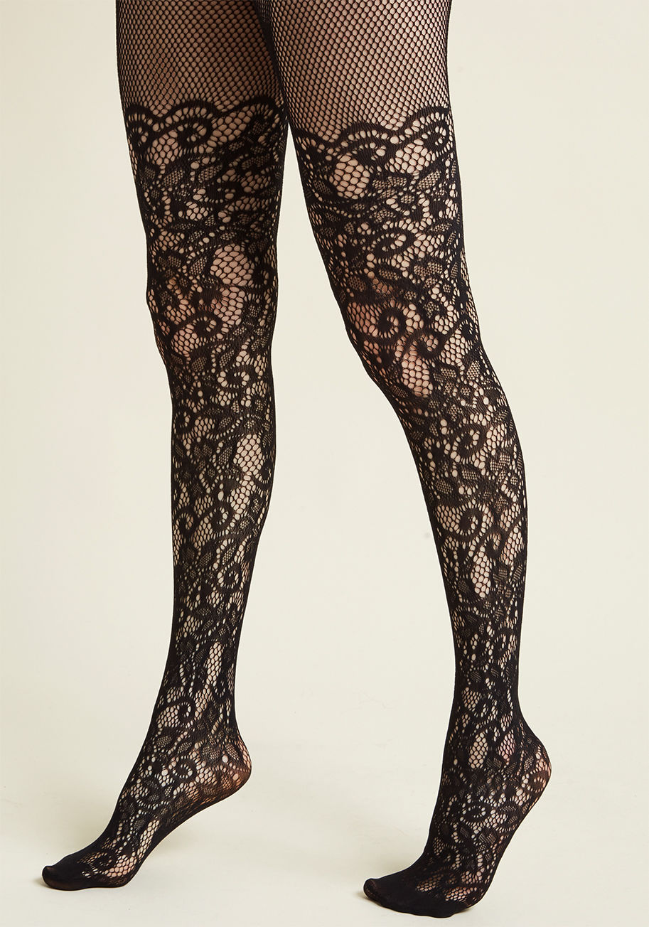  - Your ensemble exudes an unexpected level of elegance, all thanks to your pink fishnet tights. Enveloping you