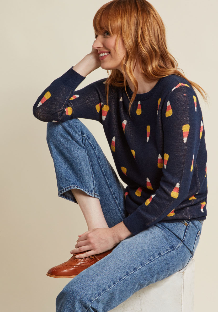  - Your favorite seasonal treat is for more than just snacking - now it's for flaunting, too! This navy blue sweater from our ModCloth namesake label is loaded with festive flavor, all thanks to its intarsia design of cascading candy corn. A pullover doesn't