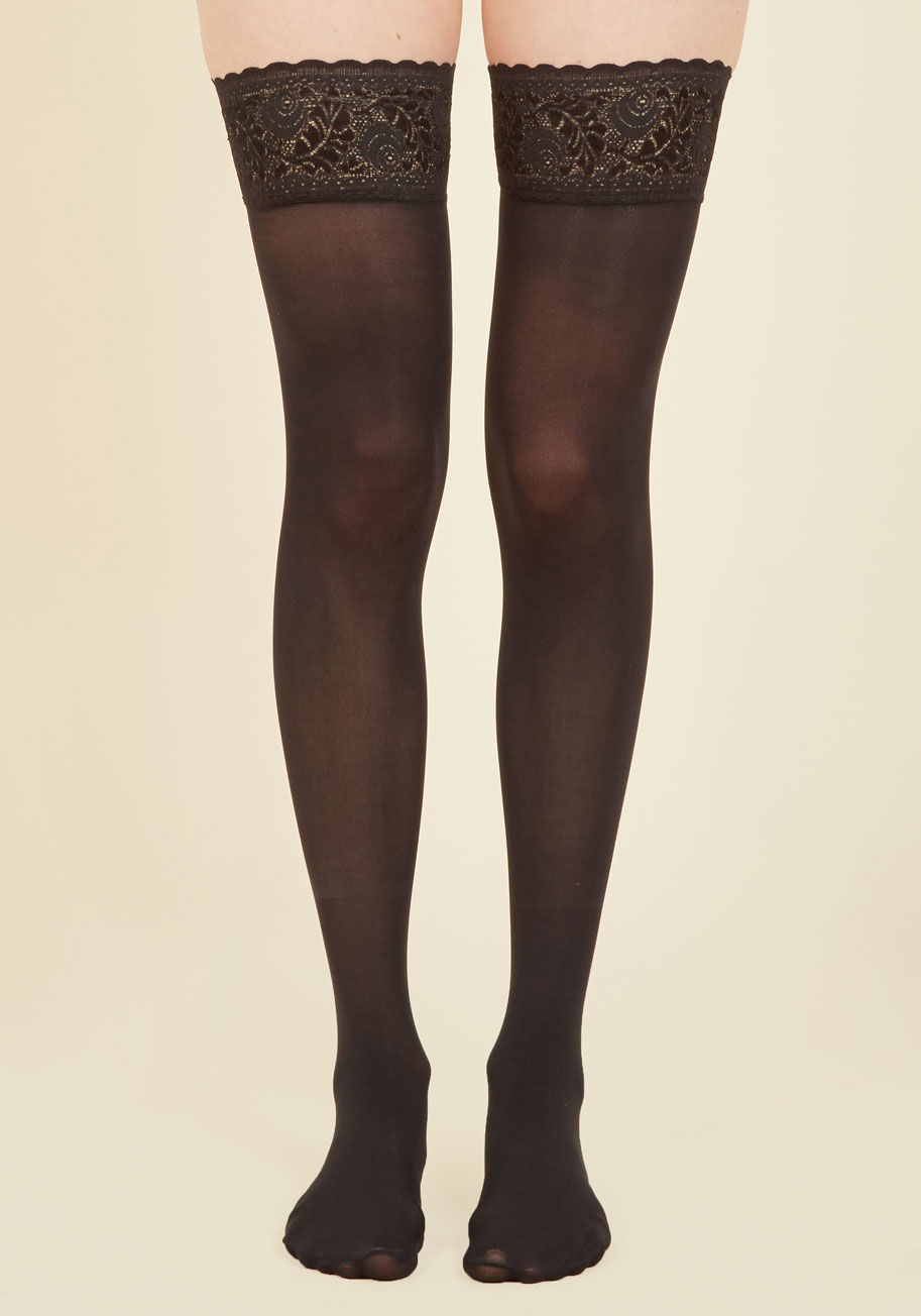  - Your outfit for the day is almost perfect, but something is missing. Searching through your sock drawer, you encounter these black thigh highs and pull them on without a second thought. Donning this hosiery's non-slip strips and lace bands, your look is c