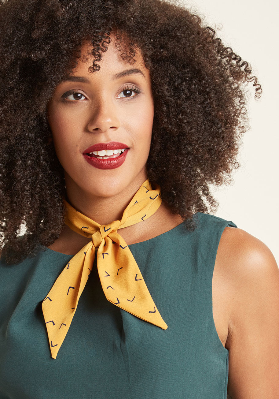  - You've waited long enough to experiment with the neck scarf look - now try it out with this mustard neckerchief! Instantly elevating your casual tees and elegant frocks with retro appeal, this accessory - with its navy chevrons and tapered ends - is a lon