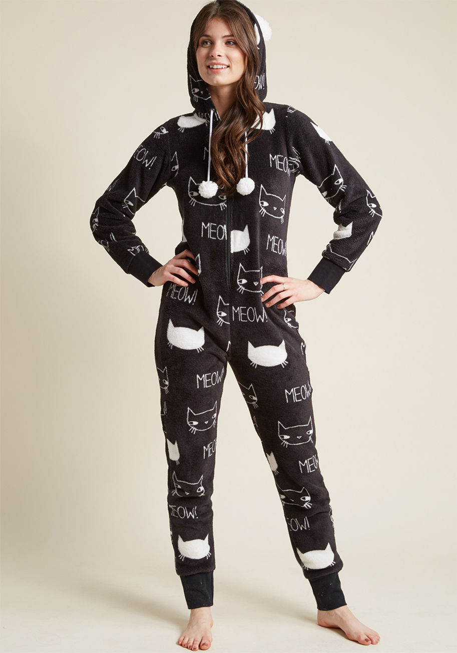 028-13508P - With a soft fleece fabric, white cat pattern, and a fuzzy-lined hood 'n' pom-poms, this black onesie is basically the best case scenario. So, what's the catch? Here's the thing - nothing! Zip into this ModCloth-exclusive one-piece's cotton sleeve and ankl