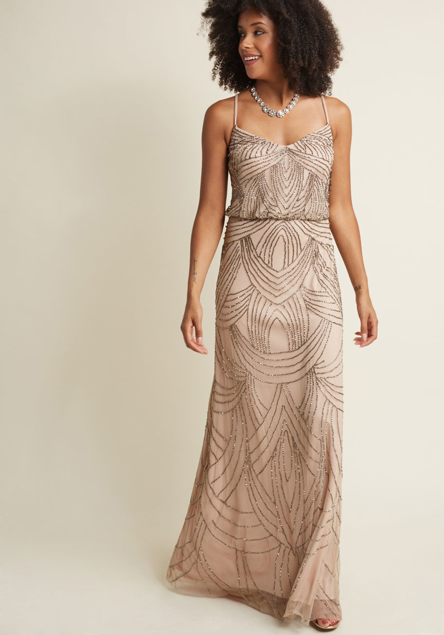 091891180 - We&rsquo;ve found your next gown over which to swoon - this neutral beauty by Adrianna Papell. Breathtakingly bedazzled with a scalloped design of pewter sequins and beads, this beige maxi dress puts a new level of bliss on your radar.