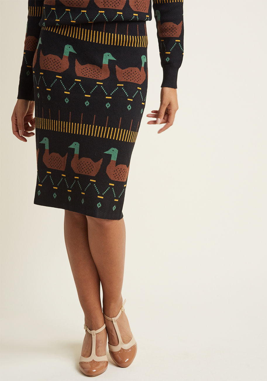 108646 - If you have your heart set on a critter-patterned bottom this year, then this black pencil skirt from Pepaloves is a must-have. This super-soft separate features a brown, golden, and green design emboldened by two rows of intarsia ducks. What's better, yo