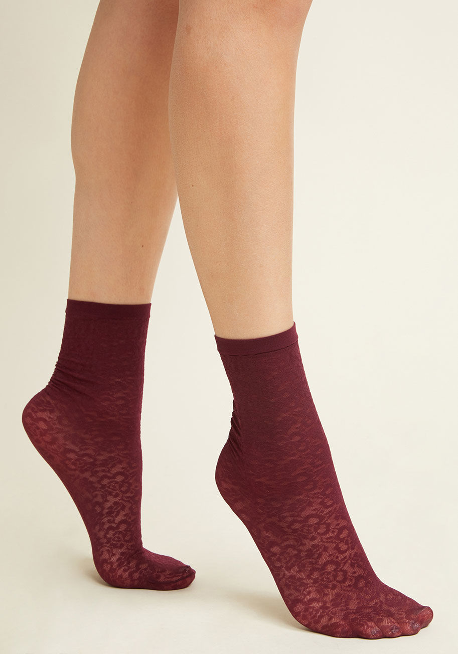 1178 - Want to fancy up your footwear a bit? These burgundy socks should do the trick! Made from sheer floral lace, this ankle-height hosiery is a pretty touch that'll take your style far.