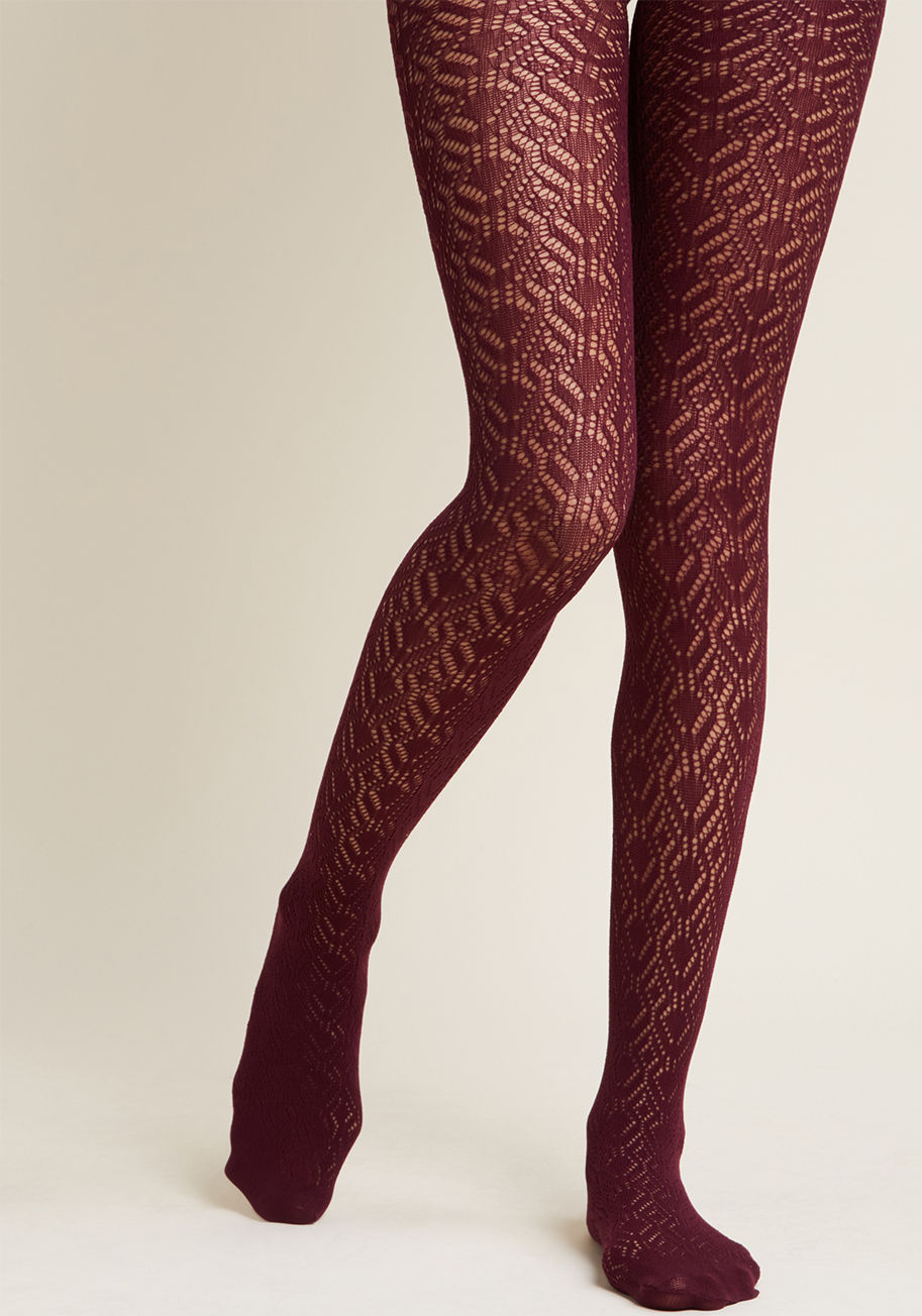 1290 - When it comes to pattern and texture, you're all over it with these sheer tights! Decorated with an angular pointelle pattern and donning a rich purple hue, this eye-catching pair marks you as the most moxie-filled fashionista on the scene.