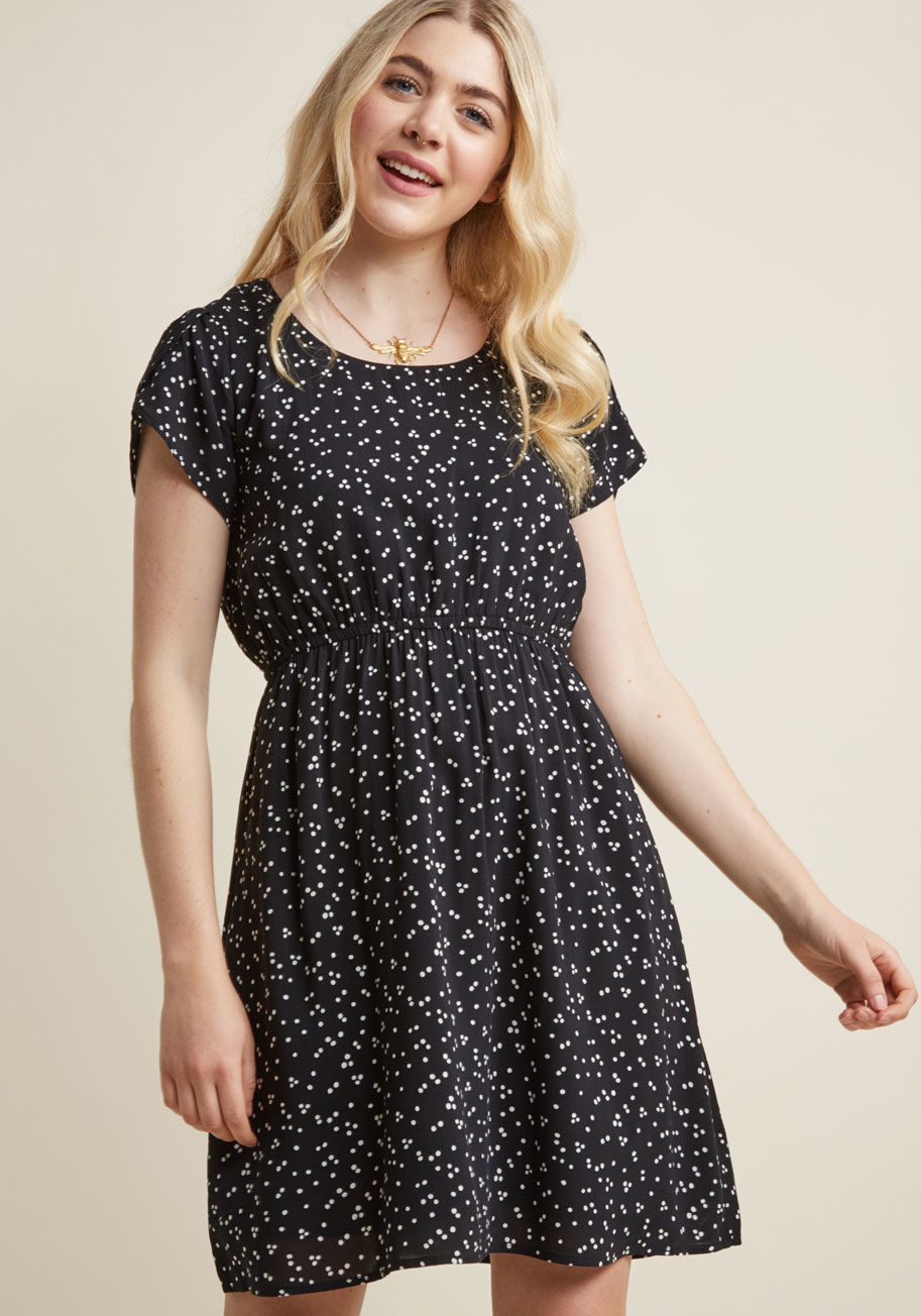 131644a - If it's this black dress that makes you happy, styling its tulip sleeves will set you free! Affixed with an elasticized waistband for shape and comfort, and equipped with white polka dots for added playfulness, this casual frock knows exactly how to fulfi