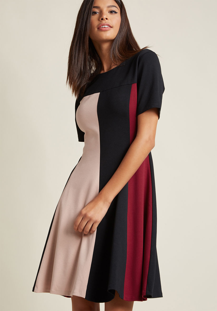 1567 - We have your new, most-loved retro essential right here - this knit dress! From its short sleeves to its flared hemline, this ModCloth-exclusive frock - paneled with black, rosewater, and burgundy hues - offers all the flair you need to bring the swingin'