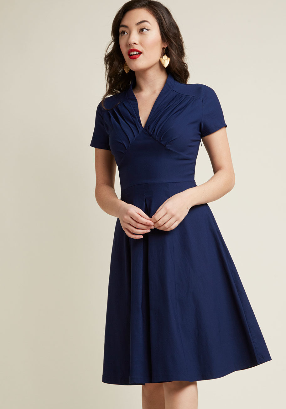 17443 - If ever a pal wishes to fill her life with sophisticated, sweet, and vintage-inspired style, you'll gladly slip into this navy blue midi dress and be