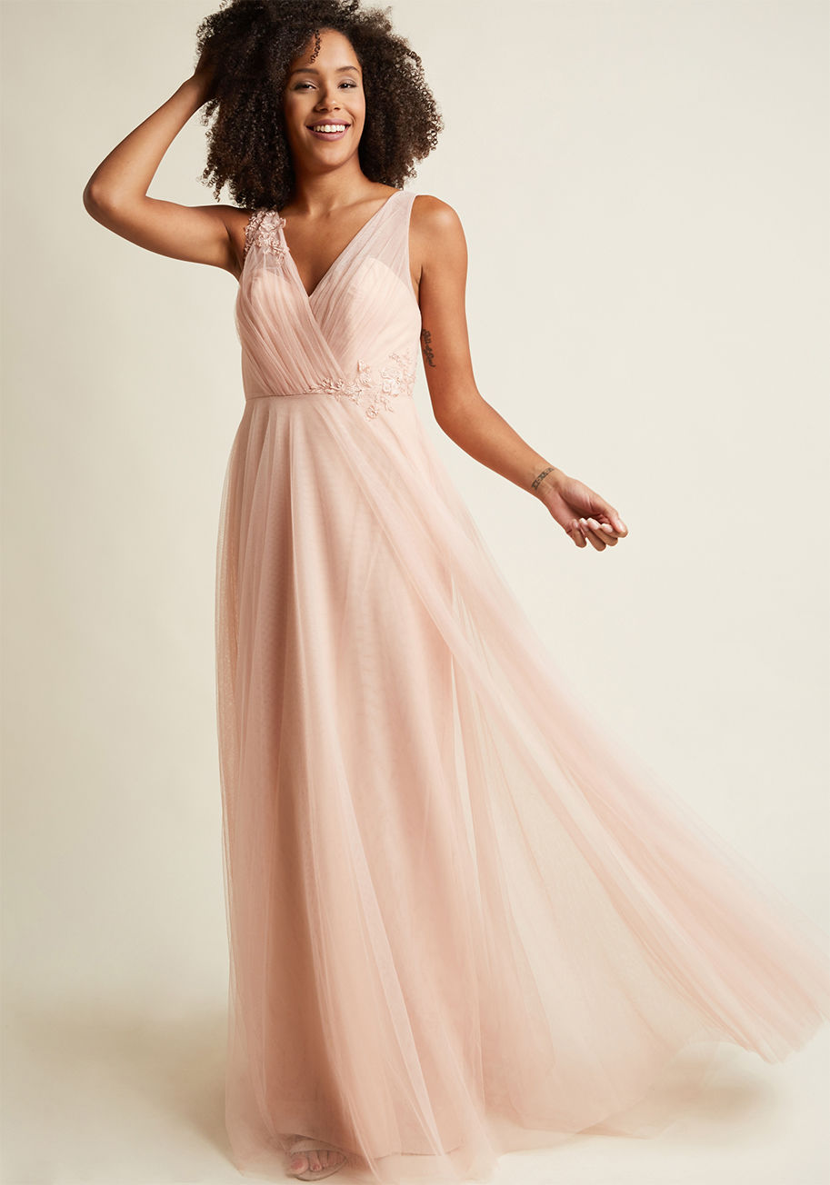 1757 - Any setting into which this blush maxi dress enters, flowers are sure to start blooming! Marvel at this Jenny Yoo gown's sweetheart illusion neckline, surplice bodice, beaded blossom embroidery, and gathered mesh overlay - you'll be