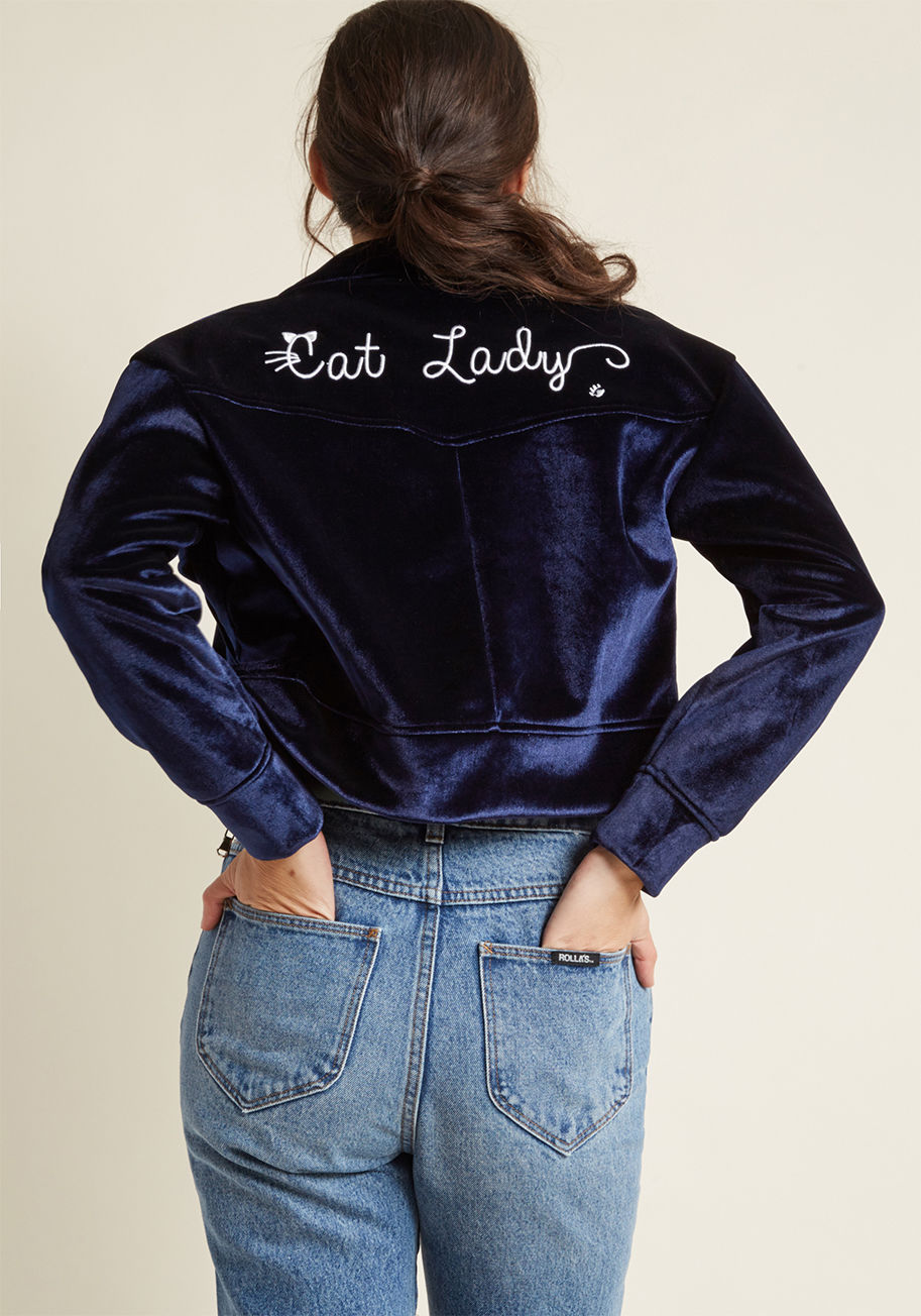 17AW-JKT-01 - You could gush all day long about how you're kitty crazy, or you could let this navy jacket do the talking! A delightful pick from Miss Patina, this cropped layer celebrates what makes you 'mew-nique' with dual chest pockets, velvet fabric, and adorable w