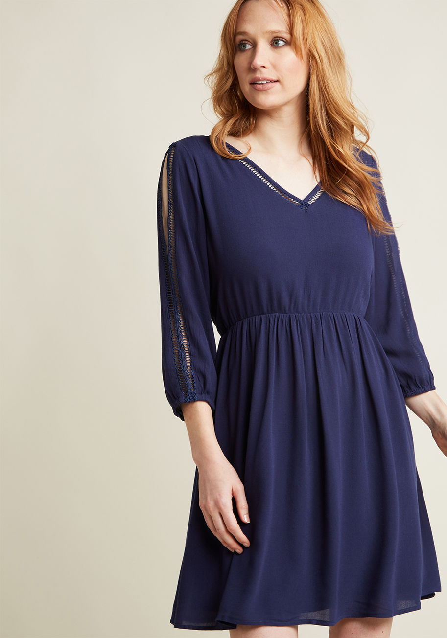 24288D - Saturday brunch is already the highlight of your weekend, but this new navy blue dress makes the outing extra electrifying! Teeming with moxie from its ladder-trimmed V-neck, V-back, and vented 3/4 sleeves, this back-tied frock flavors your dining traditi