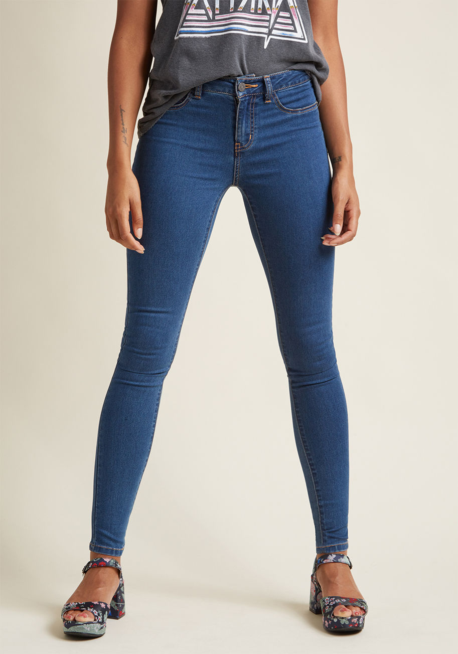 27000328 - Take your denim collection to the next level with these true blue skinny jeans! Simple, sleek, and undeniably chic, this pair's high waistline, decorative front pockets, and form-fitting silhouette assure that your stems are increasingly in-style.