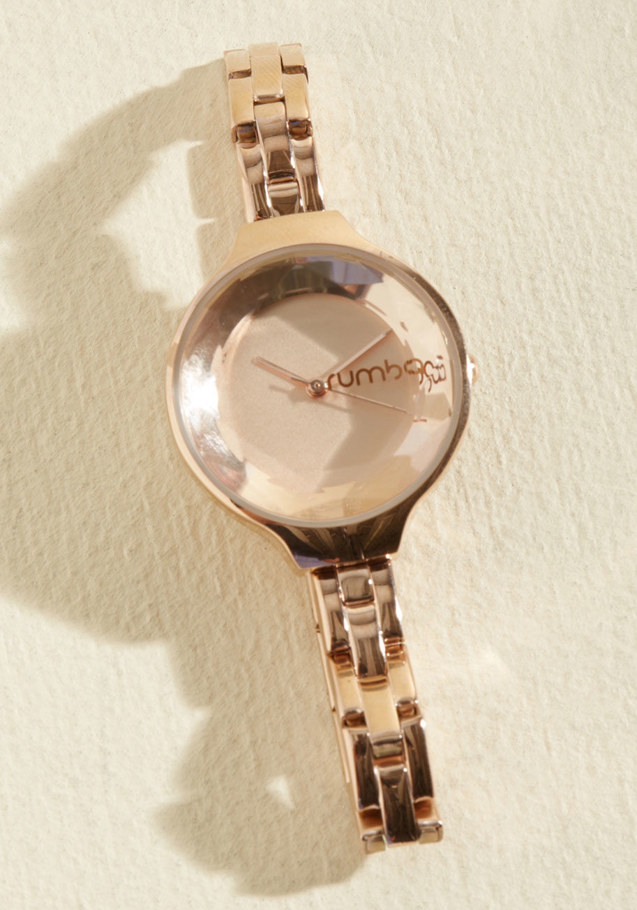 27969 - The sophisticated design of this rose gold watch from RumbaTime never rests! You love to appear polished from dawn 'til dusk and far beyond, so rely upon the stainless steel, chain-style band and faceted face of this gorgeous timepiece to carry you throug