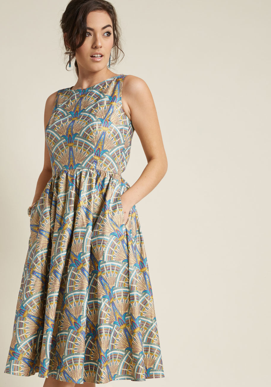 3516 - There's fine feeling attributed to finding a look that's a true keeper - discover the rush with this colorful midi dress! A ModCloth-exclusive print of Art Deco shapes brings new life to the A-line silhouette of this pocketed number from Retrolicious, and