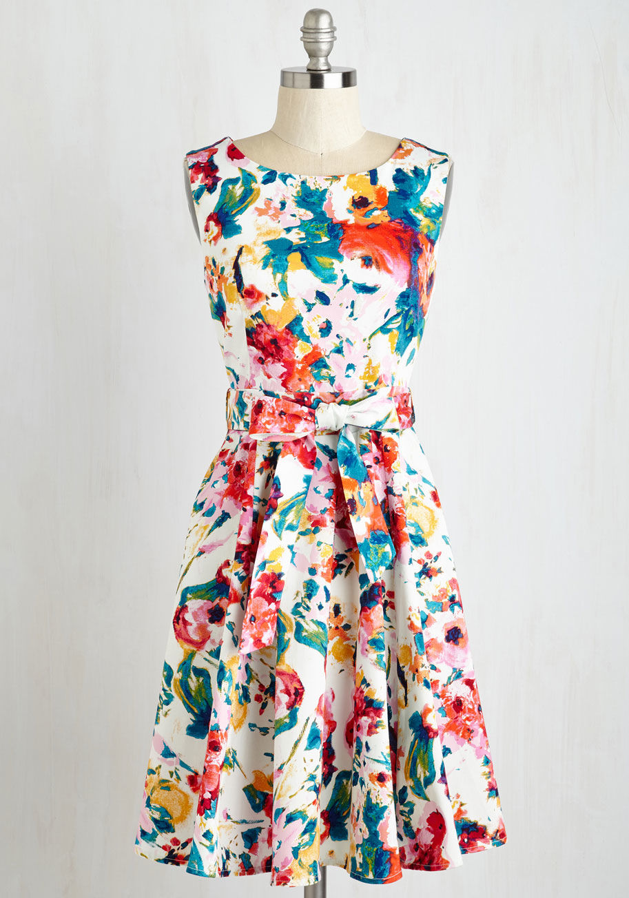 3951 - For a friend-filled soiree, the last thing you want to worry about is your outfit. So, slip into this brilliantly colorful floral dress and focus on having a great time! With a comfortable, classic fit and a feminine sash, this festive A-line is your styl