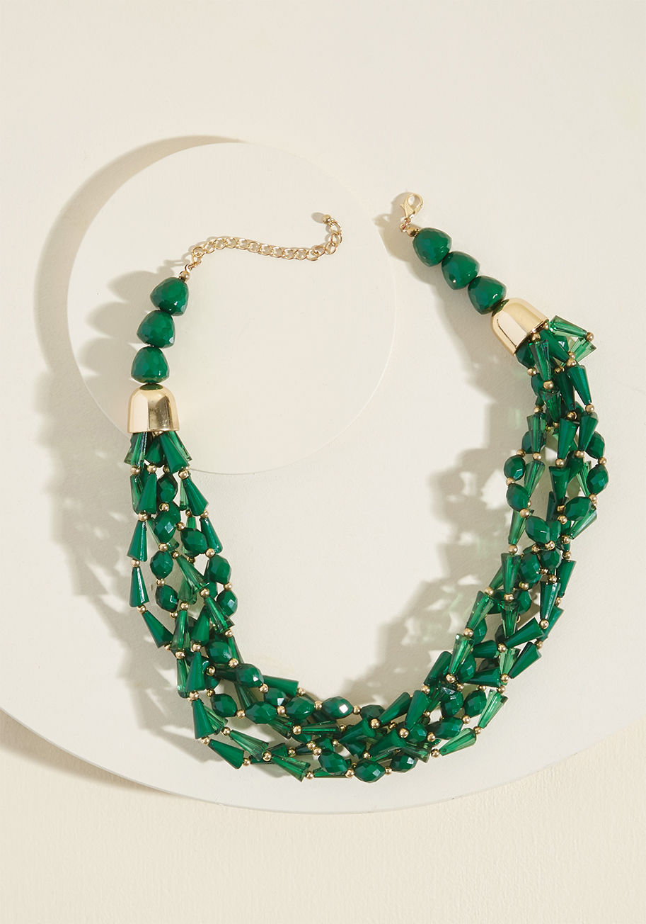 442718N-101 - The variety of gorgeous faceted beads this green statement necklace touts is enough to get you acting giddy! You'll feel thrilled whenever you top your ensemble with this accessory's gold accents and braided motif, as you should. The only thing more excit