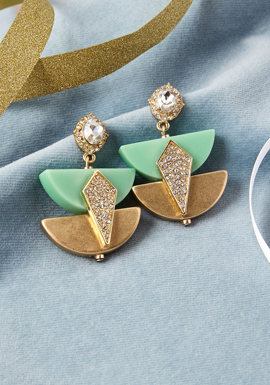 459515ER-001 - These dangly post earrings display rhinestone ovals, sparkling diamonds, and half-circle duos - all geo features worth flaunting immediately! Glammed up with gold and mint tones, this out-of-the-ordinary pair are the epitome of sparkly intrigue.