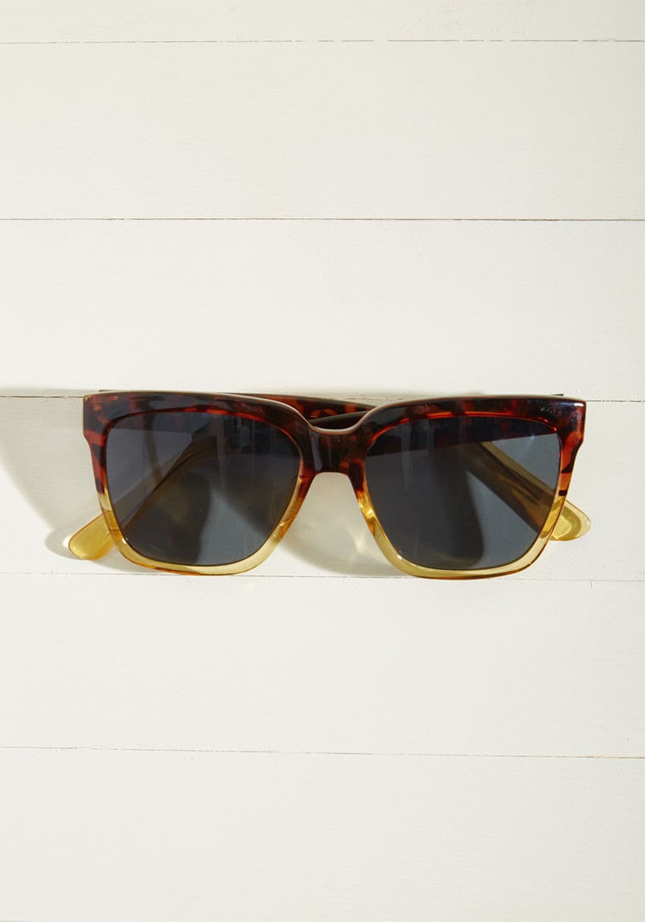 62191- trt - Name a more iconic duo than you and these two-toned sunglasses - we'll wait! Tortoiseshell uppers and translucent, amber-hued bottoms frame the geometric lenses of this posh pair, giving your visage some added va-va-voom. What a pal these sunnies can be!