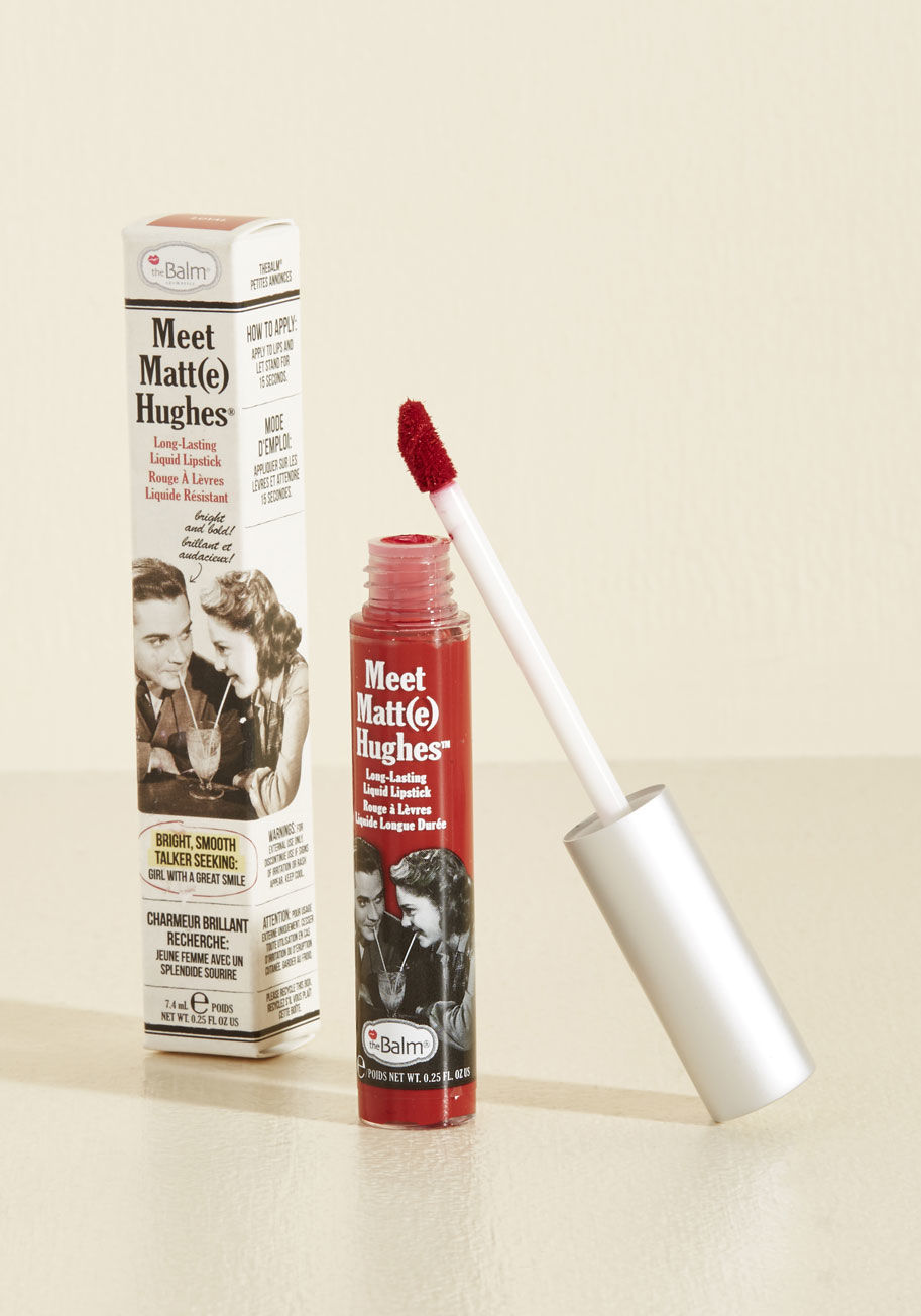 681619805172 - Swipe this deep red lip gloss by theBalm over your pucker and you&rsquo;ll feel sassy